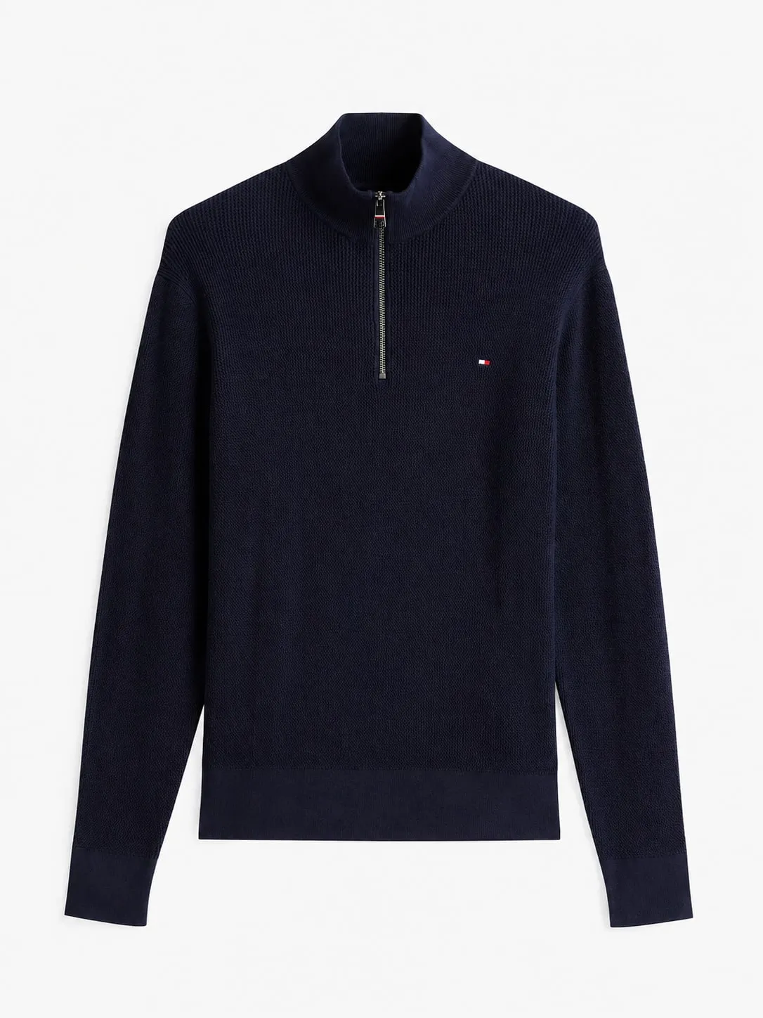 Buzo Tommy Hilfiger azul marino, vista frontal de la prenda sola con la cremallera hasta el pecho y la bandera bordada a la derecha